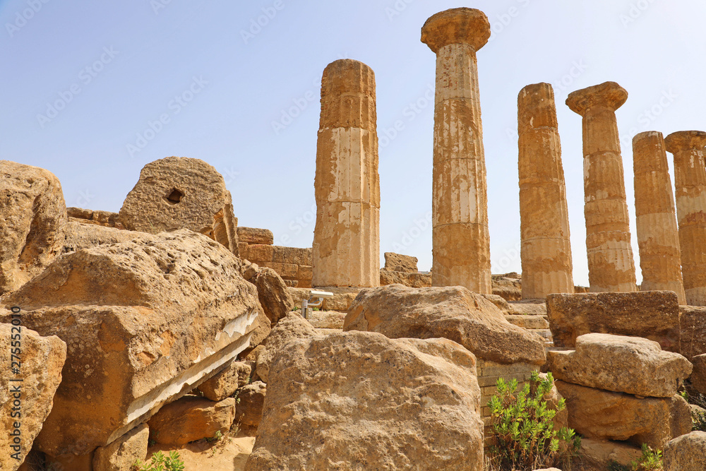 Ruined Temple of Heracles columns in famous ancient Valley of Temples of Agrigento, Sicily, Italy. UNESCO World Heritage Site.