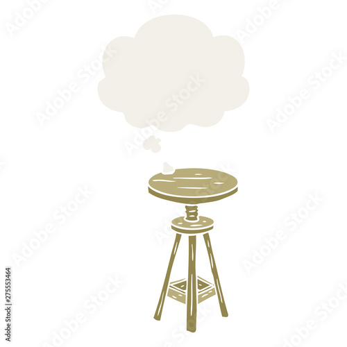 cartoon artist stool and thought bubble in retro style