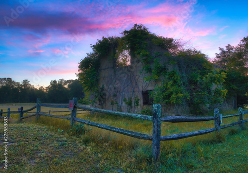 Peaceful sunrise over abandoned ruins of an old building at Pine Barrens, New Jersey. HDR photography photo