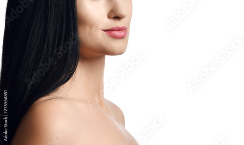 Advertisement concept close up portrait of woman brunette with long straight hair with bare shoulders and slight smile on her lips
