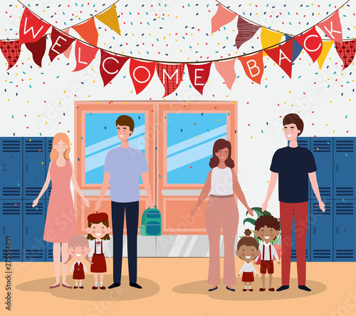 teacher couple with little students kids in the school corridor
