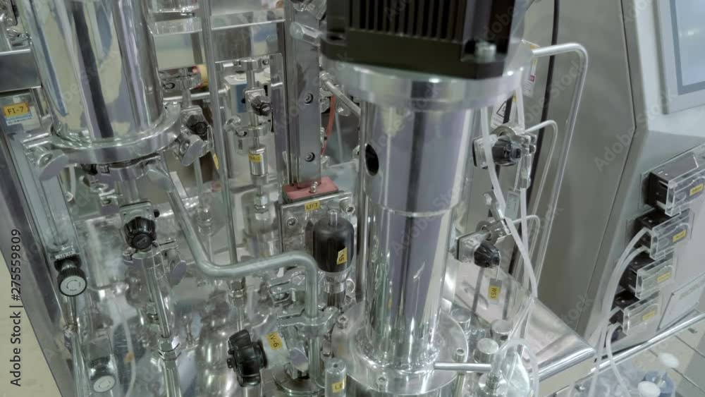Laboratory equipment for vacuum distillation, glass flasks, tubes, coils and other equipment for the chemical industry. Shot in motion Laboratory equipment for vacuum distillation, glass flasks, tubes, coils and other equipment for the chemical industry. Shot in motion