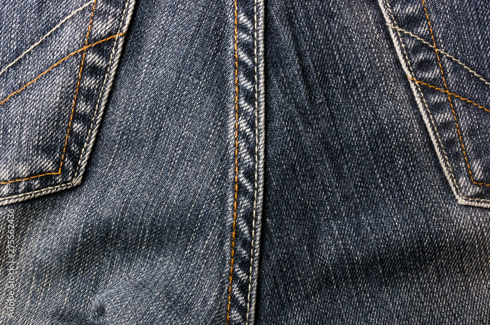 clothing items blue stonewashed faded jeans cotton fabric texture with seams, clasps, buttons and rivets, macro, close-up clothing items blue stonewashed faded jeans cotton fabric texture with seams, clasps, buttons and rivets, macro, close-up