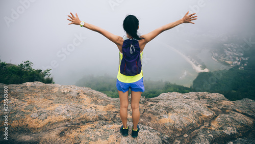 Photography Successful Woman Hiker feel free In Seaside Mountain Top