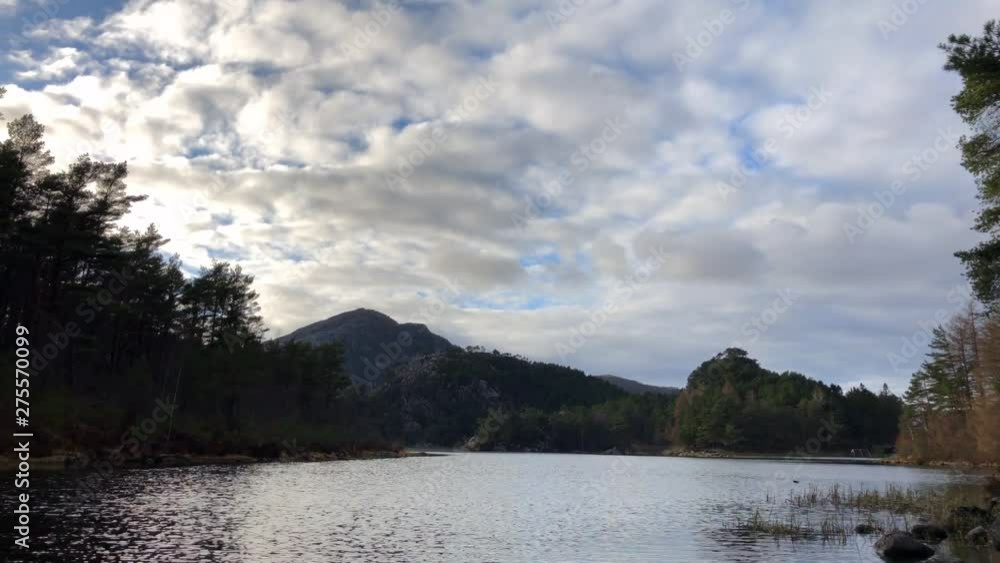 Moving time lapse in the forest at a lake Moving time lapse in the forest at a lake