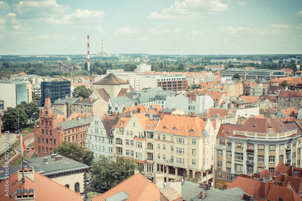 Poznan, Poland - June 28, 2016: Vintage photo, View on old and modern buildings in polish town Poznan