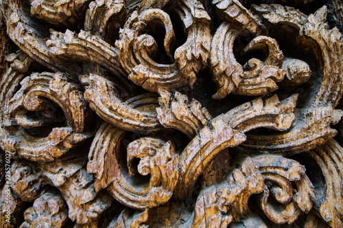 Ancient wood carving in Donsak temple photo