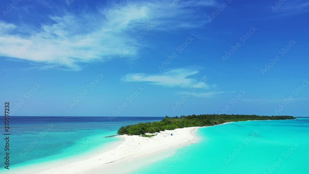 Flight away from an island. A sandy beach in the foreground with trees in the background. Dolly out. In Hawaiis turquoise sea Flight away from an island. A sandy beach in the foreground with trees in the background. Dolly out. In Hawaiis turquoise sea