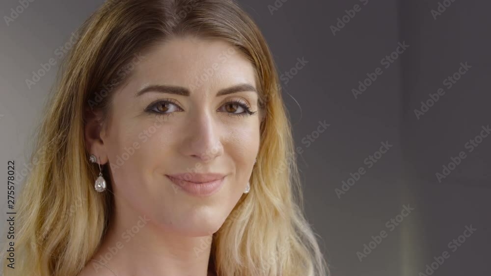 Portrait of a young woman smiling Portrait of a young woman smiling