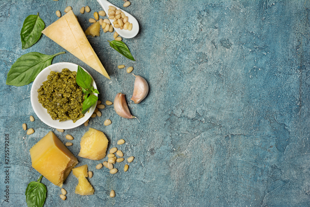 Top view of ingredients for pesto sauce - obrazy, fototapety, plakaty 
