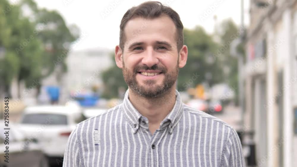 Outdoor Portrait of Smiling Beard Casual Man Outdoor Portrait of Smiling Beard Casual Man