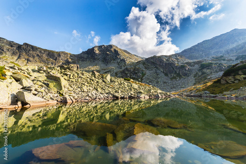 Fototapeta Naklejka Na Ścianę i Meble -  Summer mountain scenery, with granite peaks and glacier valley geologic formations