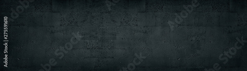 Photo Black tuff brick wall wide texture