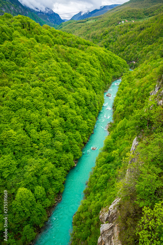 Montenegro, Perfect clean crystal clear waters of tara river flowing through green untouched nature landscape of famous tara canyon, second largest canyon in the world photo