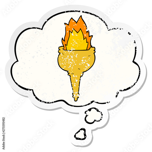 cartoon flaming torch and thought bubble as a distressed worn sticker