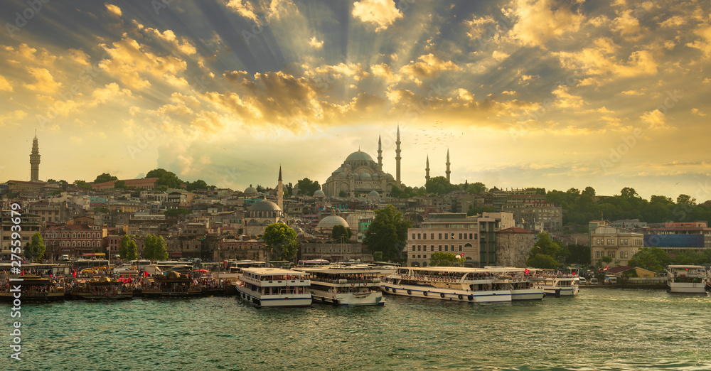 Istanbul is Turkey's most famous city. The capital of Eastern tourism. Sunset over Eminonu square and historical buildings