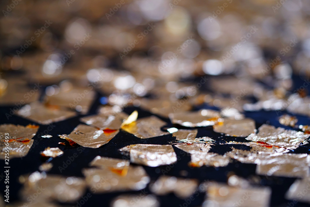 Shiny gild gold leaf and golden foil bokeh abstract background. Shiny gild gold leaf and golden foil bokeh abstract background.