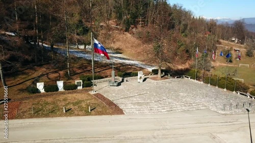 LITIJA, SLOVENIA, 2016.08.23: Aerial: Flying in front of Geoss monument. Geoss is the geometric centre of the country Slovenia. photo