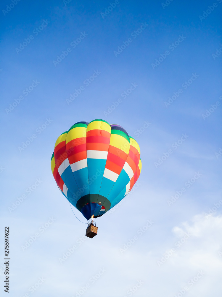 Hot air balloon with blue sky background with copyspace Hot air balloon with blue sky background with copyspace