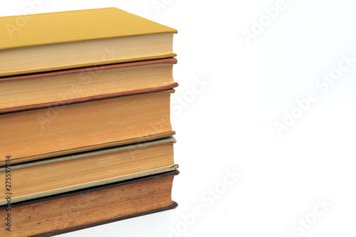 vintage old hardcover stack of books on white background.