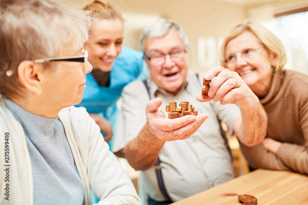 Seniors enjoy a game of patience Seniors enjoy a game of patience