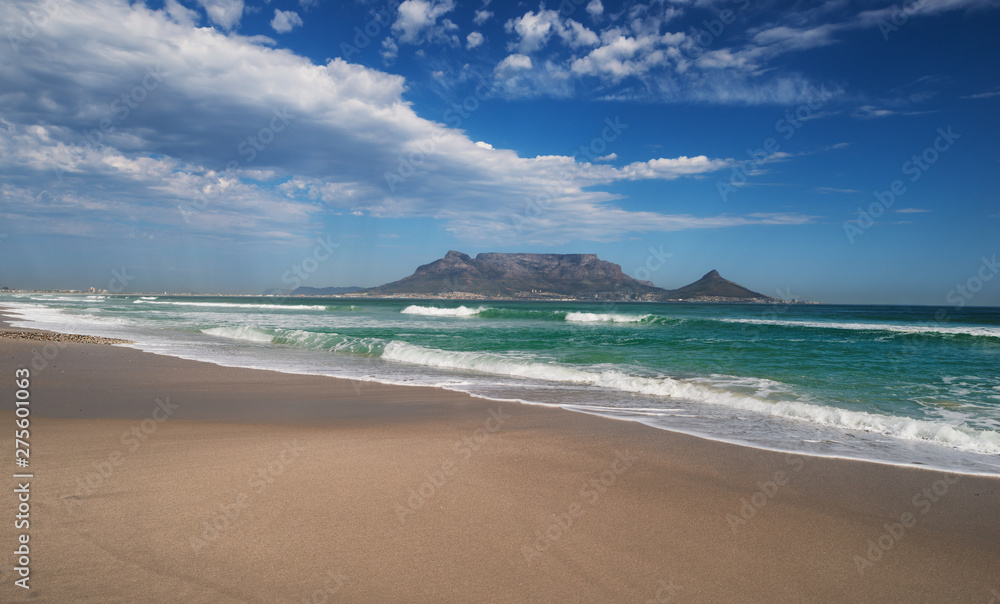 Fototapeta premium Sunset Beach near Cape Town. View to Table Mountain