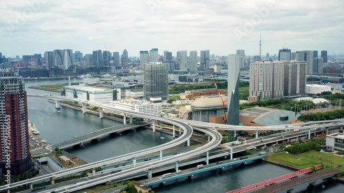 interchanger with building and bridge in Tokyo Bay in aerial view photo