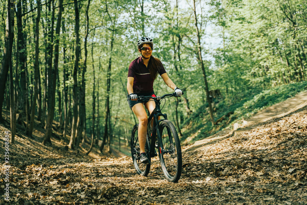 Women is riding on bicycle. Women is riding on bicycle.