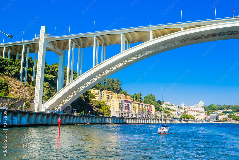 Arrabida Bridge in Porto Portugal, crossing the Douro River and linking Porto with Vila Nova de Gaia Arrabida Bridge in Porto Portugal, crossing the Douro River and linking Porto with Vila Nova de Gaia