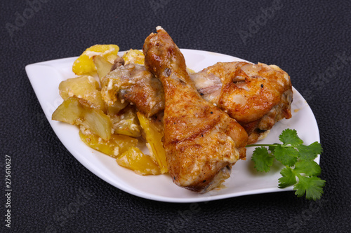 Roasted chicken legs with potato