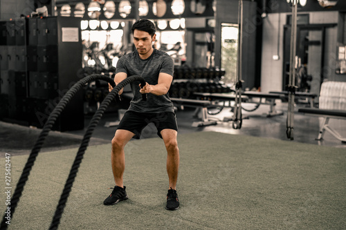 Fit young man workout in a gym