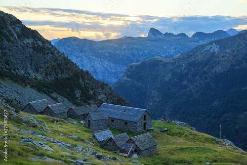 Wallpaper Mural Tranquil dusk at an old mountain hut (Capanna Alpe Cornavosa) in Ticino, Switzerland. Torontodigital.ca