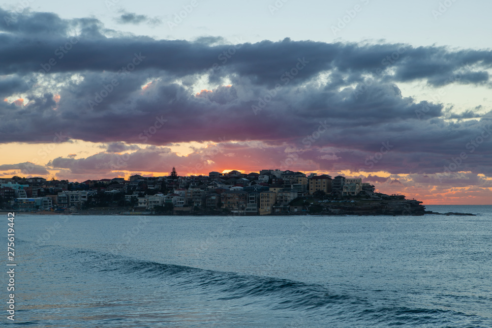 Cloudy sunrise view of North Bondi Beach, Sydney, Australia.