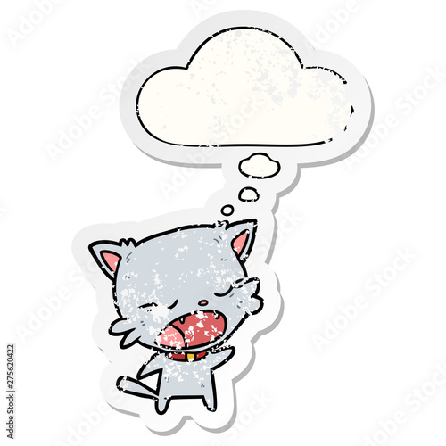 cartoon cat talking and thought bubble as a distressed worn sticker
