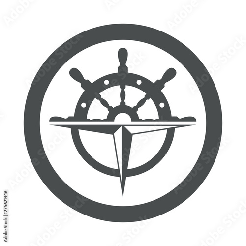 Icono plano timón y brújula en círculo en color gris
