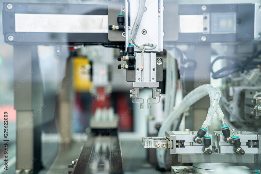 automation machine and detail close up in machine automatic with robotic automation technology for technology production factory automation machine and detail close up in machine automatic with robotic automation technology for technology production factory
