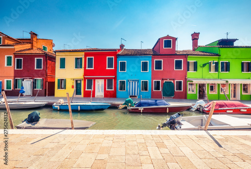 Multicolored houses on Burano island, Venice, Italy, on a summer day. Architecture and travel background. photo