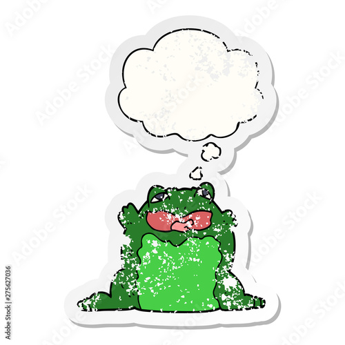 cartoon toad and thought bubble as a distressed worn sticker