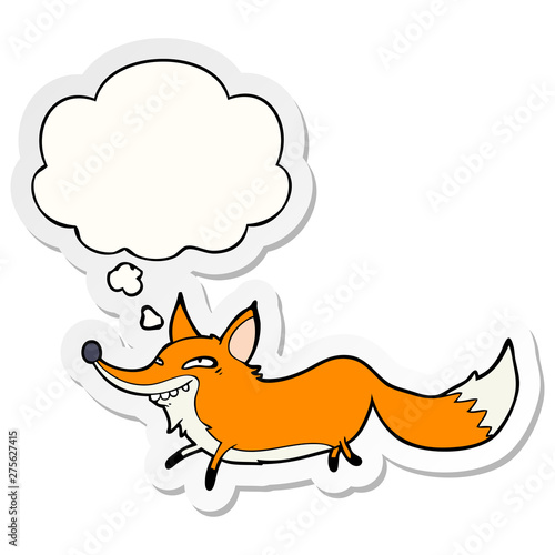 cartoon sly fox and thought bubble as a printed sticker