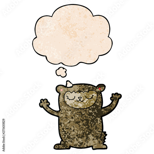 cute cartoon bear and thought bubble in grunge texture pattern style