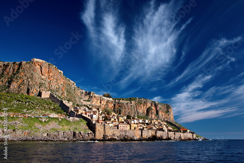 Impressive view of the medieval "castletown" of Monemvasia from the sea. Lakonia, Peloponnese, Greece. Monemvasia is often called "The Greek Gibraltar". 