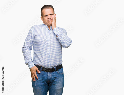 Middle age arab business man over isolated background thinking looking tired and bored with depression problems with crossed arms.