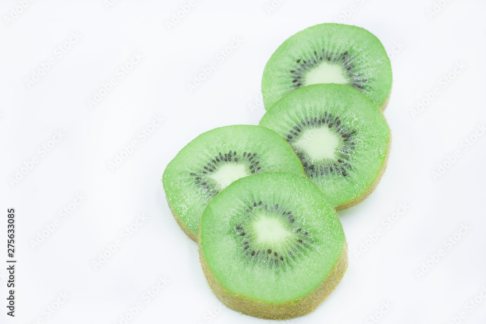 Ripe whole kiwi fruit and half kiwi fruit isolated on white background Ripe whole kiwi fruit and half kiwi fruit isolated on white background