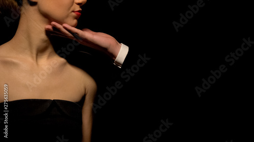 Slika na platnu Man touching female face, choosing prostitute for one-night stand, bawdy house