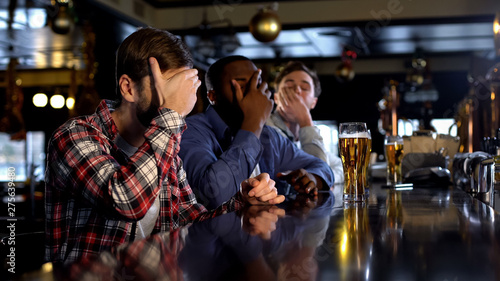 Deeply upset about soccer team losing male fans watching match in pub  facepalm