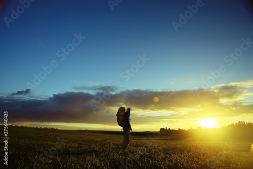 traveler sunset, man at sunset travels, extreme vacation, single tourism concept, trekking, landscape with man, beautiful sunset