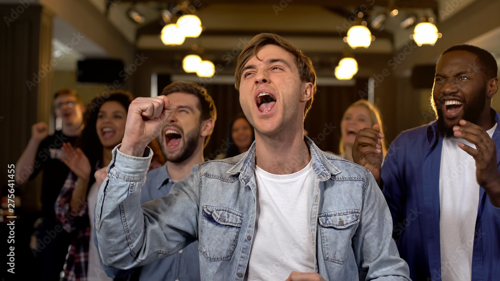 Fototapeta premium Happy match spectators cheering for team, championship enthusiasm, support