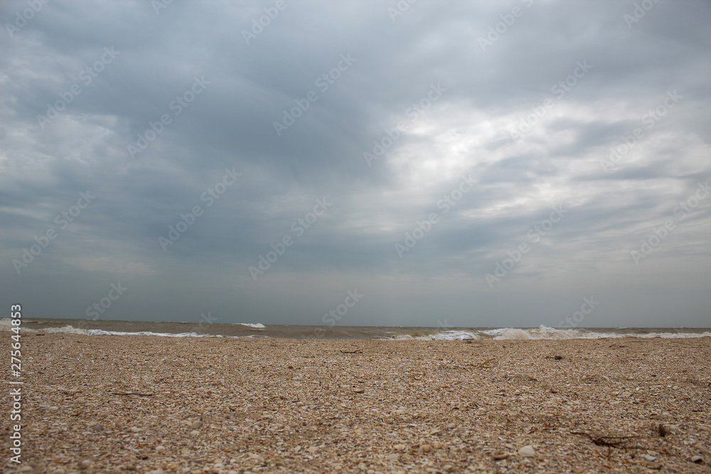 Sea during a storm. Waves against the sky. There is a place for text. Copy space. Summer concept Sea during a storm. Waves against the sky. There is a place for text. Copy space. Summer concept