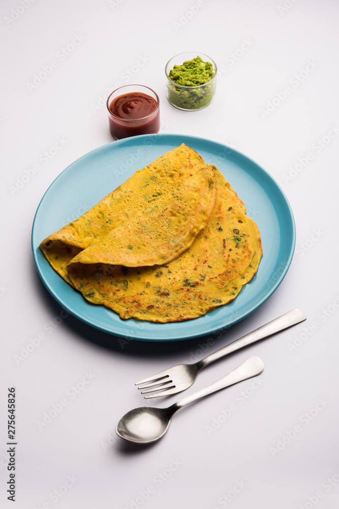 Chilla or Besan cheela is a simple pancake made with chickpea flour and some basic ingredients served with green chutney and tomato sauce, also known as veg-omelette Chilla or Besan cheela is a simple pancake made with chickpea flour and some basic ingredients served with green chutney and tomato sauce, also known as veg-omelette