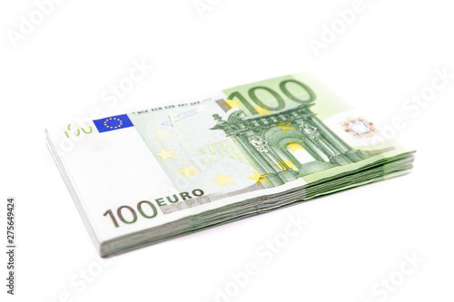 Stack of 100 Euro banknotes. European currency money banknotes isolated on white backdrop. Perspective view closeup. Salary, savings, european union economic crisis concept.